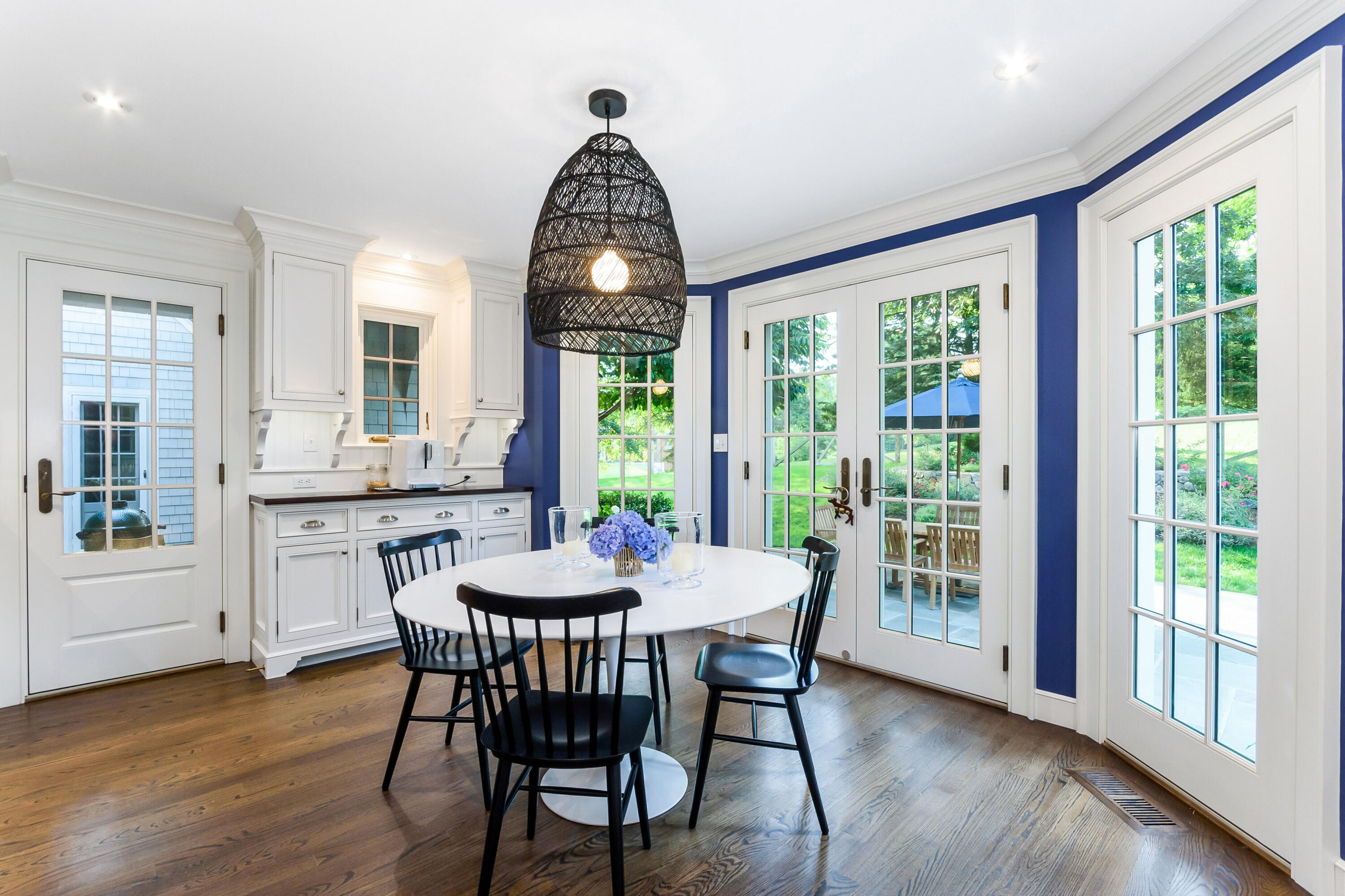 9 Sylvan Road Darien, CT 06820 - Photo 12 of 39 a view of a dining room with furniture window and wooden floor