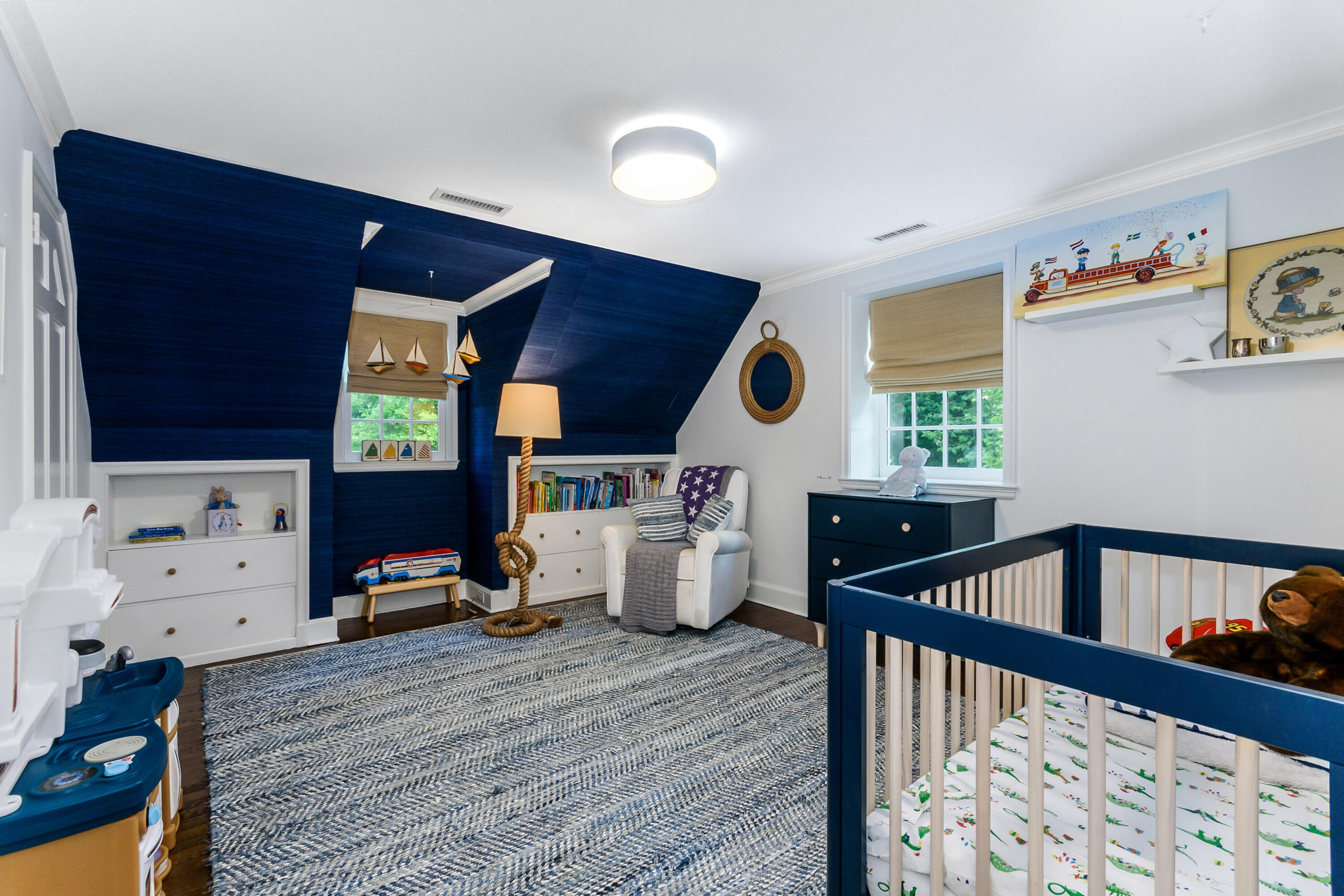 9 Sylvan Road Darien, CT 06820 - Photo 25 of 39 a bedroom with furniture and wooden floor