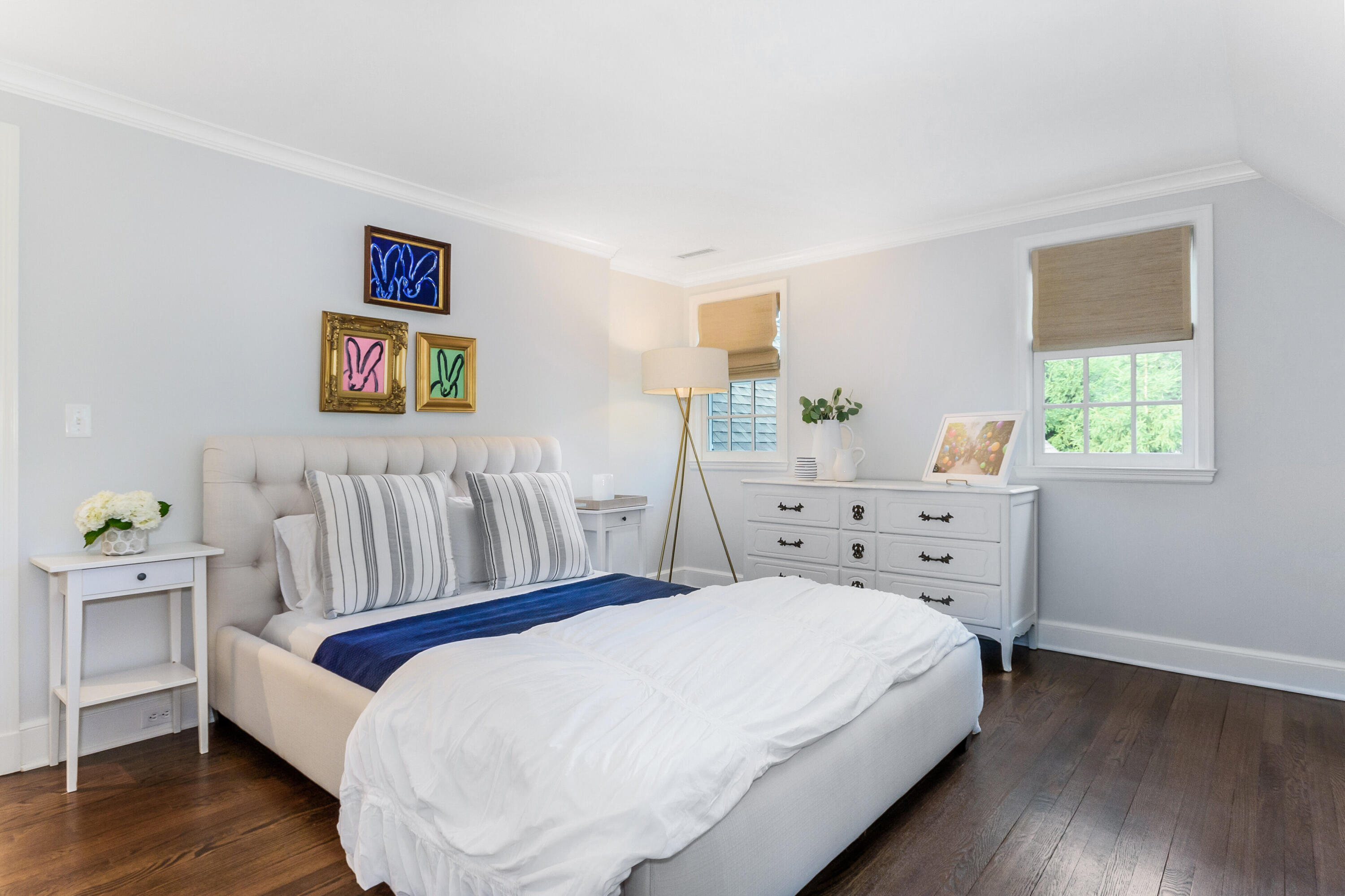 9 Sylvan Road Darien, CT 06820 - Photo 27 of 39 a bedroom with a bed and wooden floor