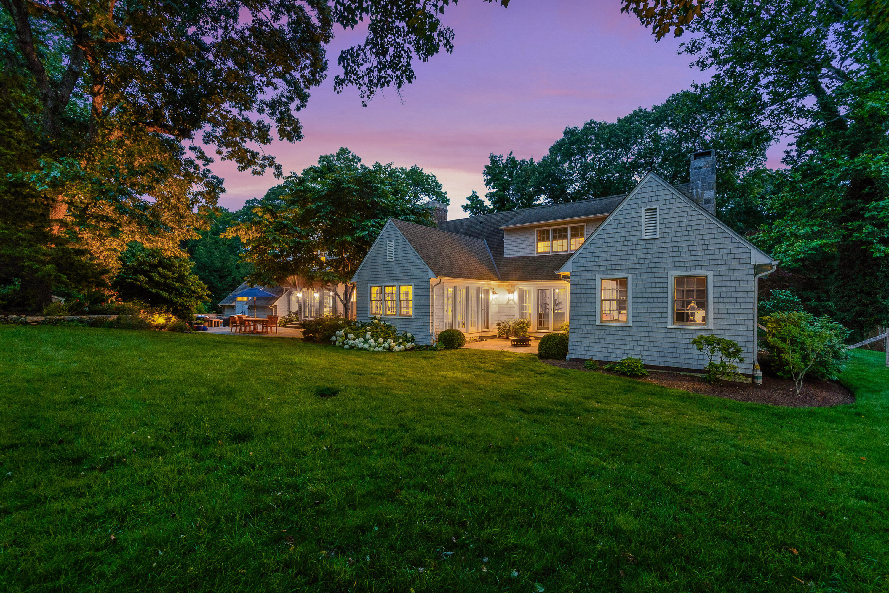 9 Sylvan Road Darien, CT 06820 - Photo 33 of 39 a front view of a house with a garden