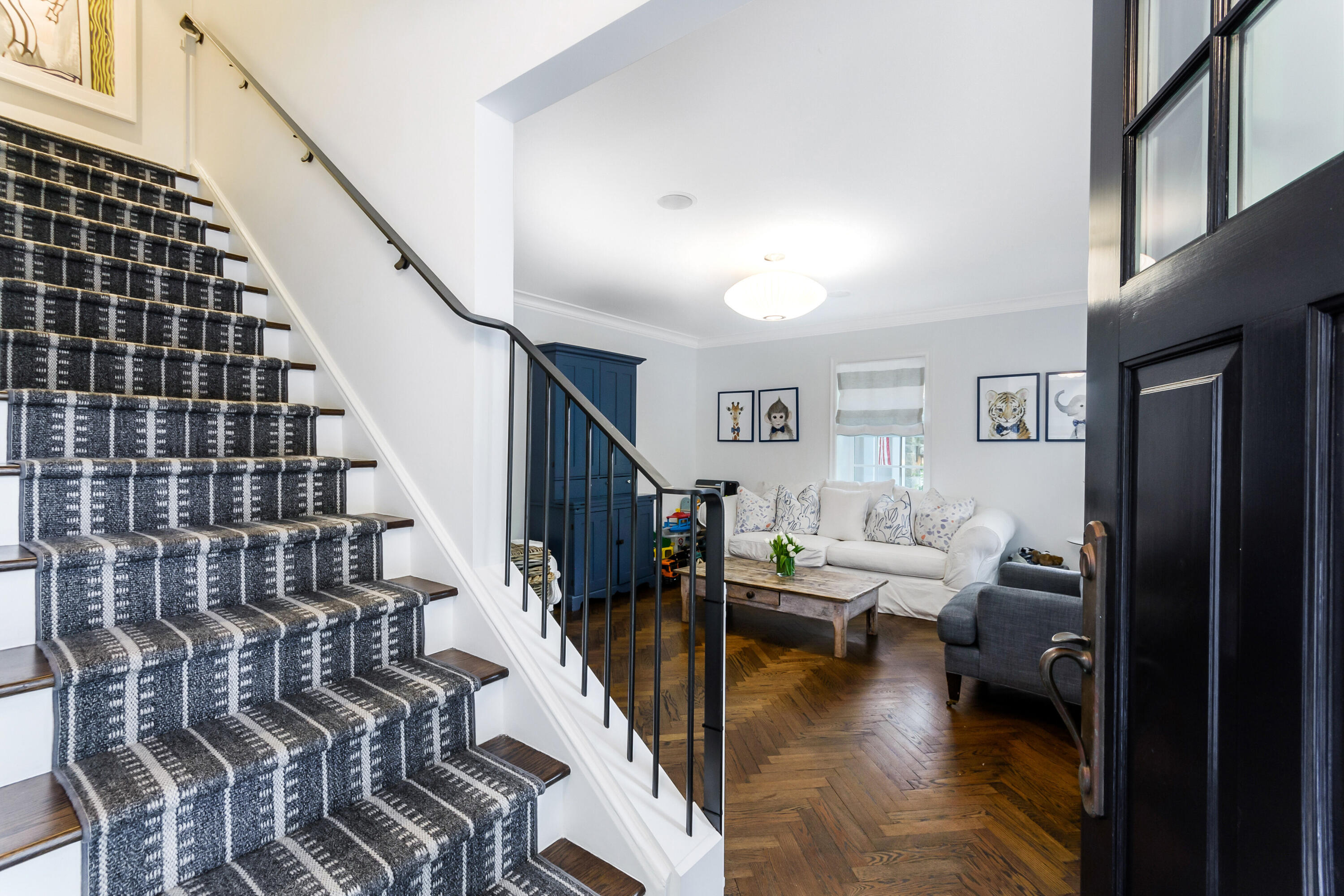 9 Sylvan Road Darien, CT 06820 - Photo 4 of 39 a living room with furniture or stairs and a wooden floor