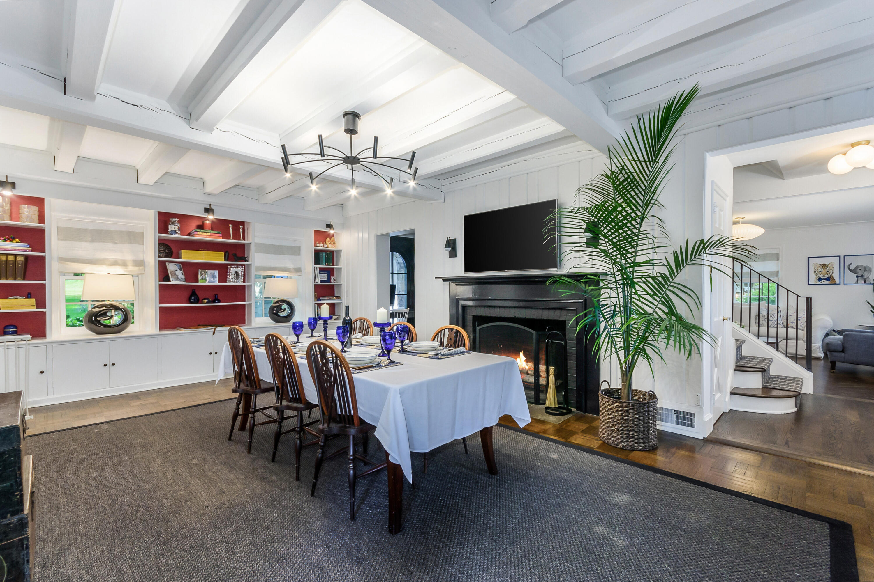 9 Sylvan Road Darien, CT 06820 - Photo 9 of 39 a living room with furniture a fireplace and a potted plant