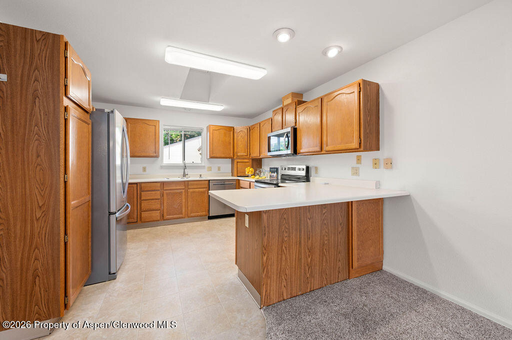 12 Rheims Court Grand Junction, CO 81507 - Photo 19 of 42 Kitchen - Breakfast Bar
