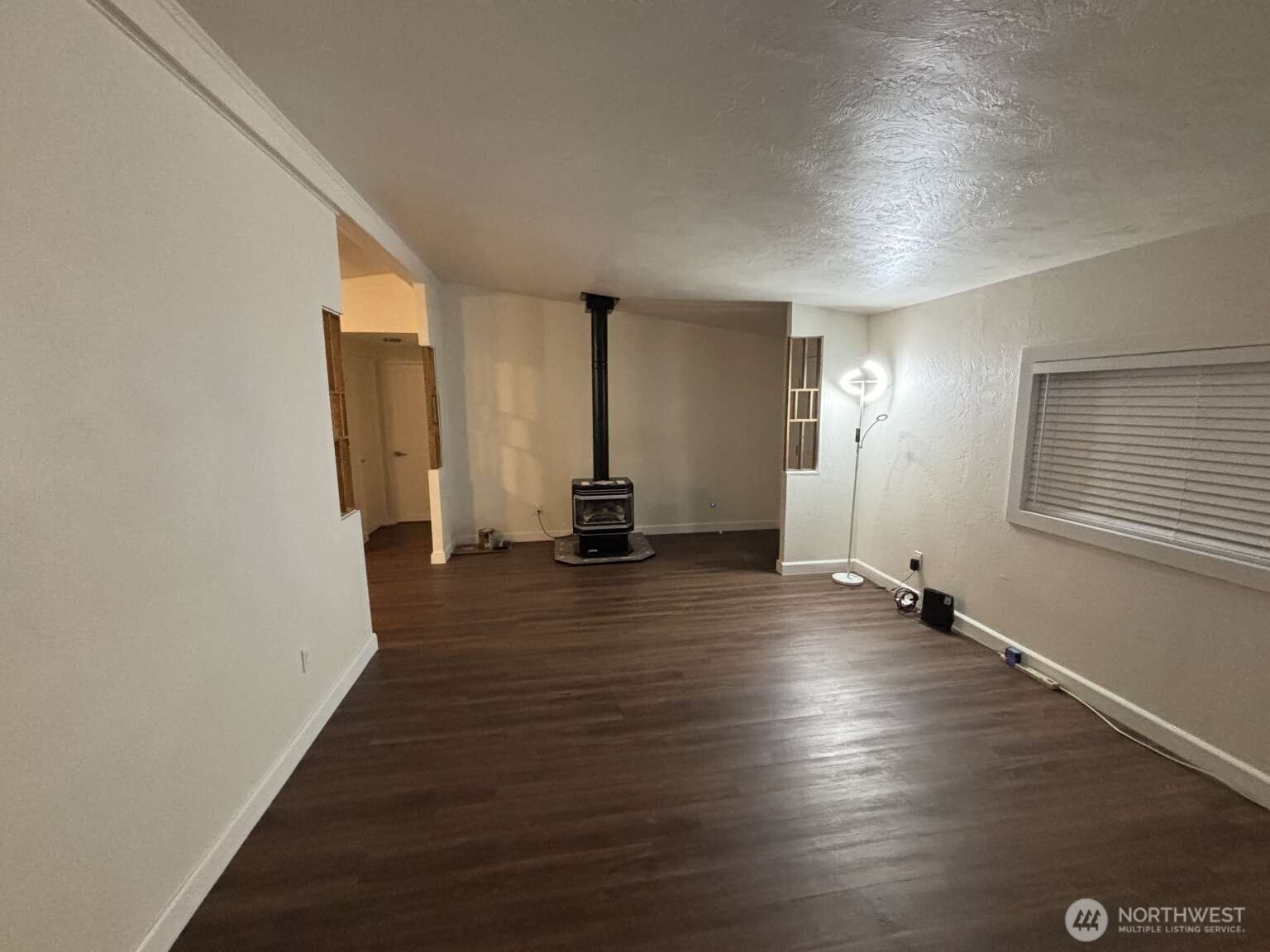 12615 Northeast 189th Street Bothell, WA 98011 - Photo 21 of 40 a view of a room with wooden floor
