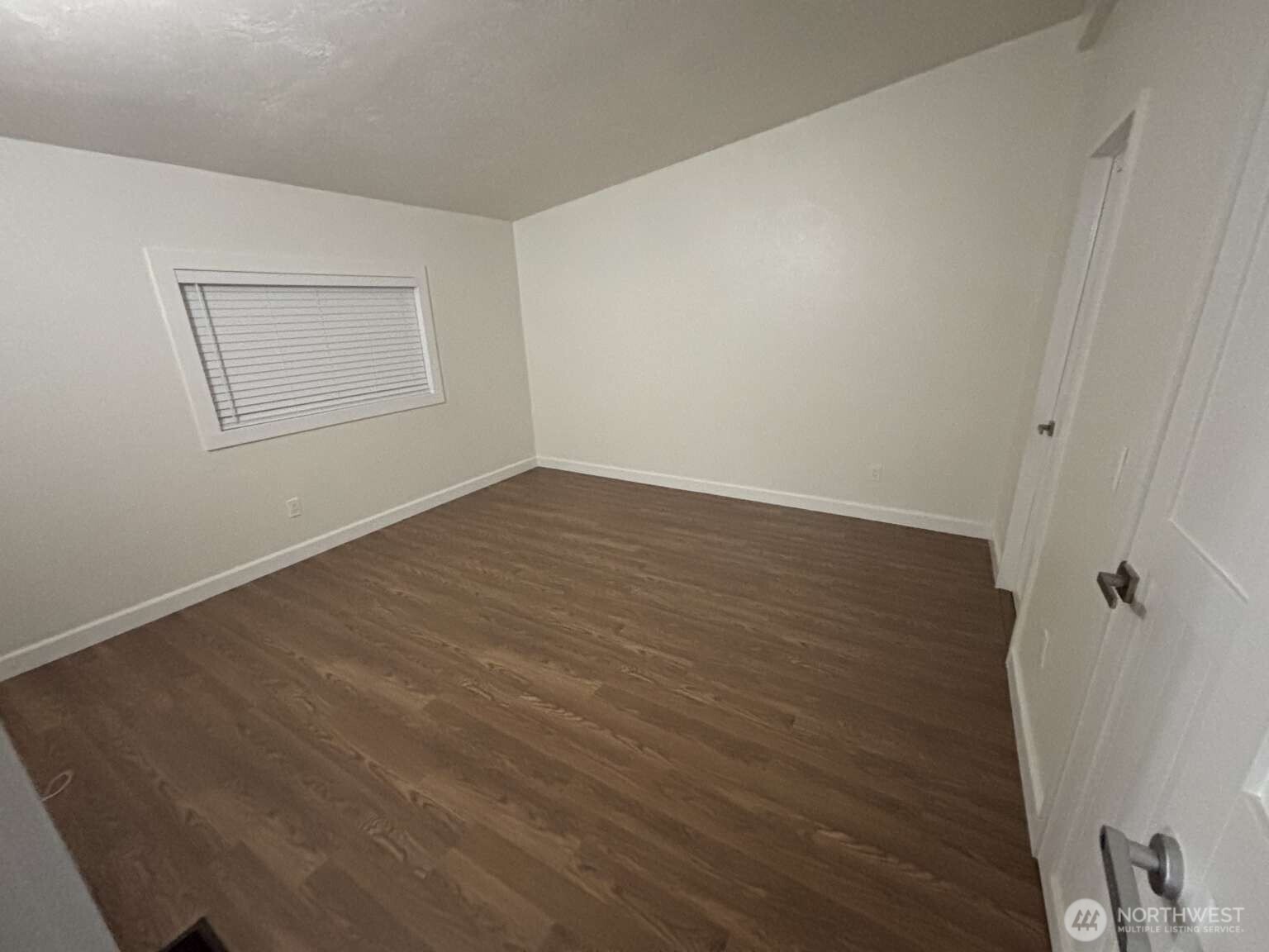12615 Northeast 189th Street Bothell, WA 98011 - Photo 24 of 40 wooden floor in an empty room