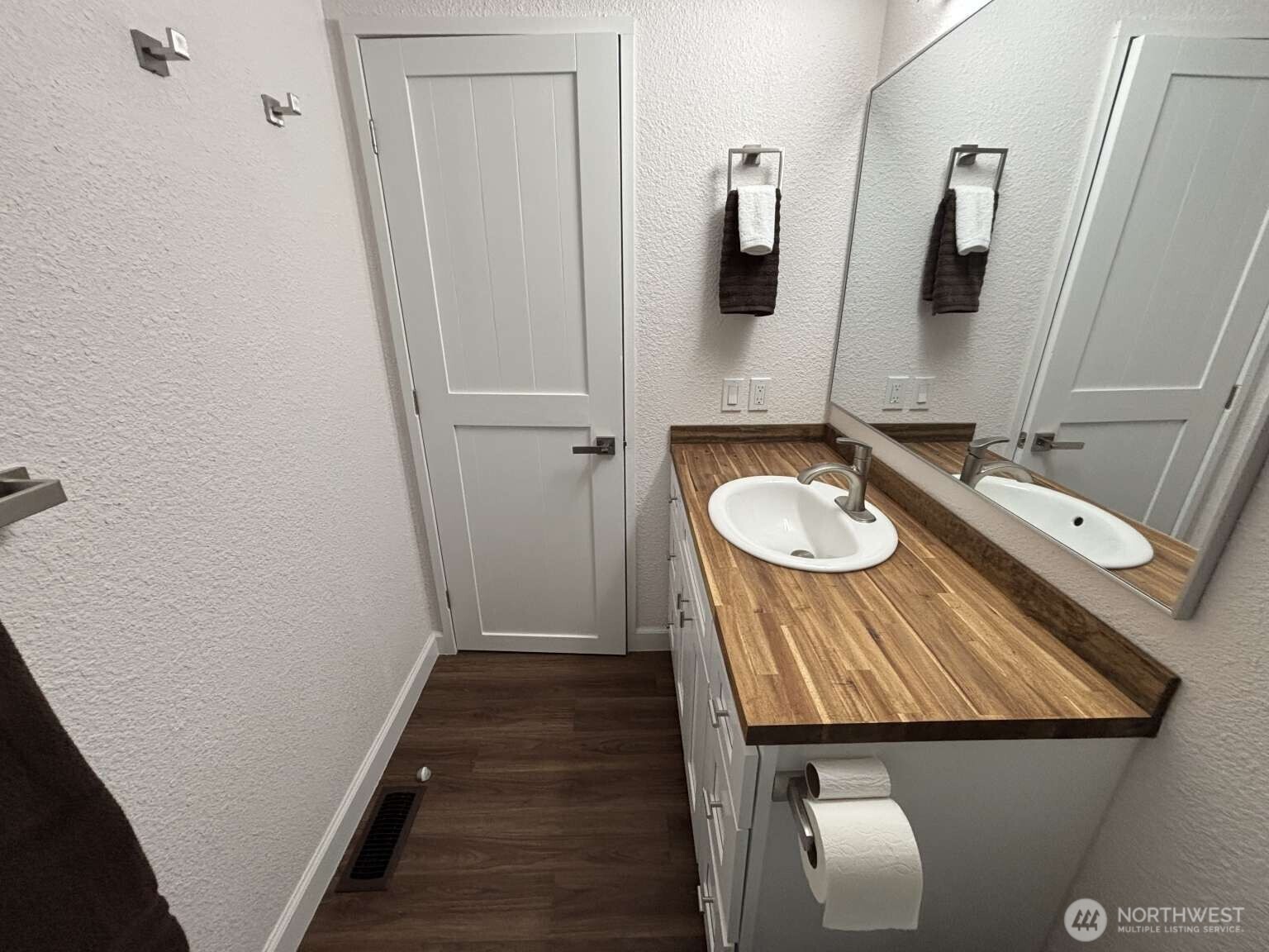 12615 Northeast 189th Street Bothell, WA 98011 - Photo 32 of 40 a bathroom with a granite countertop sink and a mirror