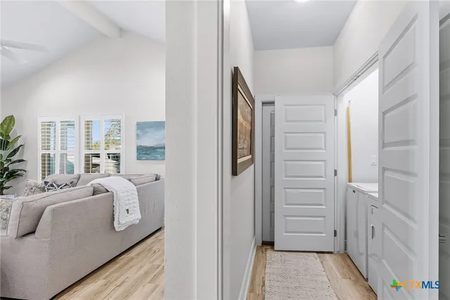 a room with a bed and a window