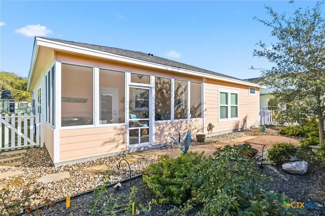 a house with a sitting space and garden view