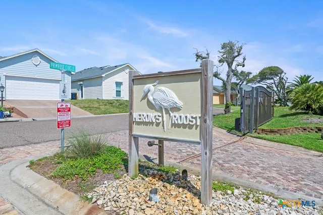 a sign that is on the side of a road