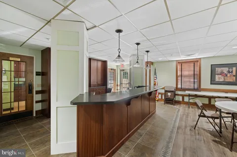 a view of a living room and dining room
