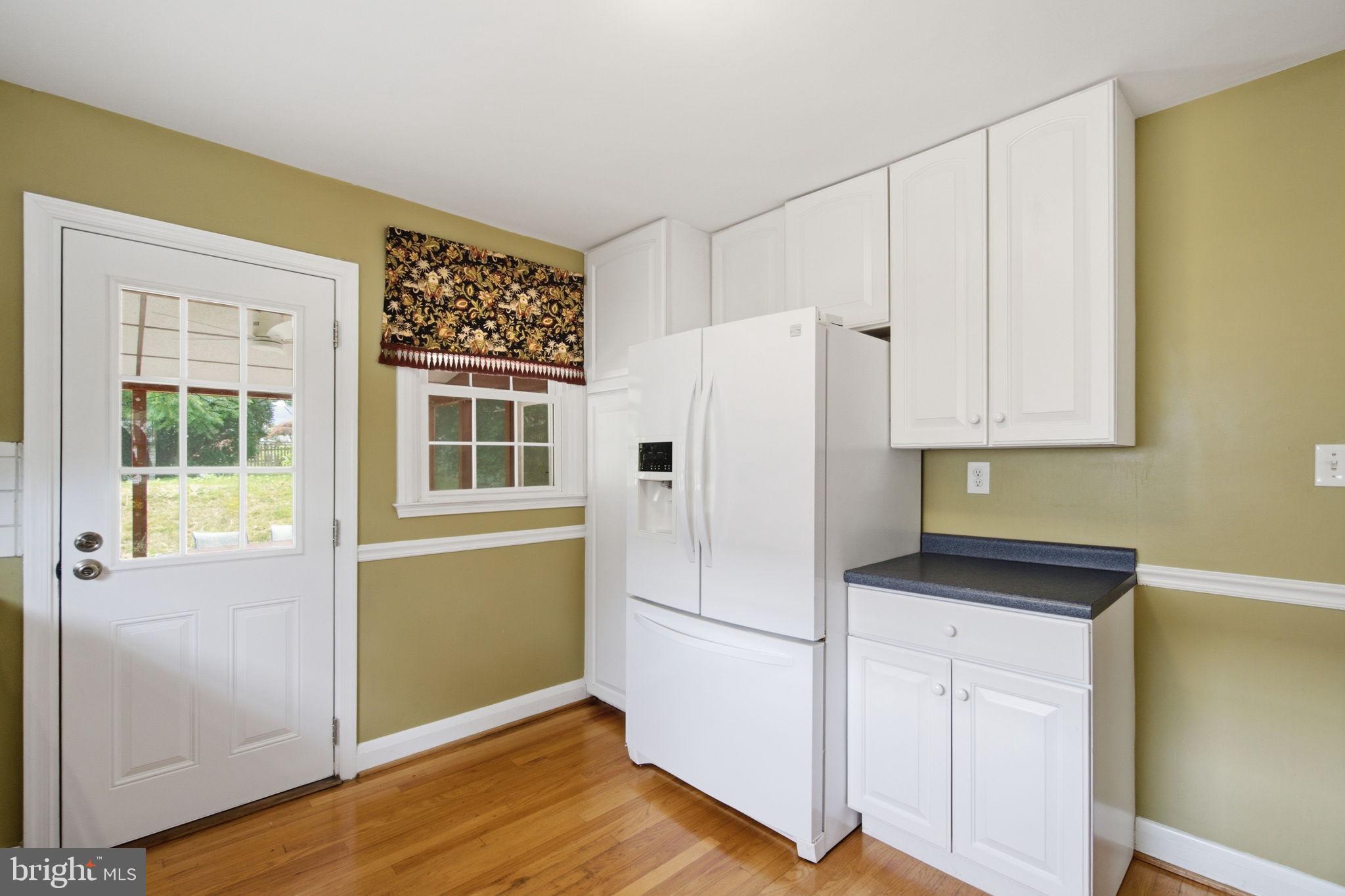 107 Oakway Road Lutherville-Timonium, MD 21093 - Photo 9 of 52 Kitchen with a suite of white matching appliances