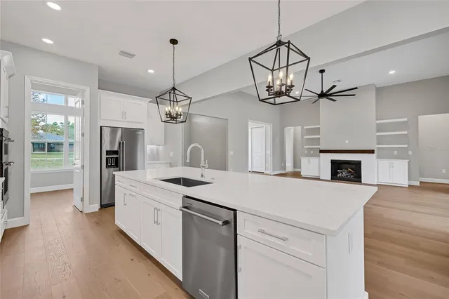 a view of living room with furniture and flat screen tv