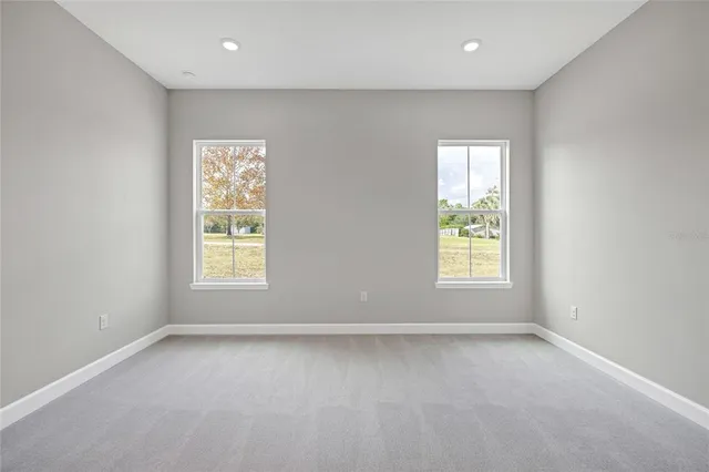 an empty room with windows