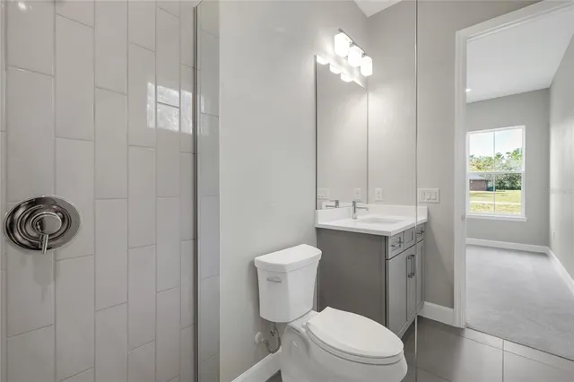 a view of an empty room and fire place