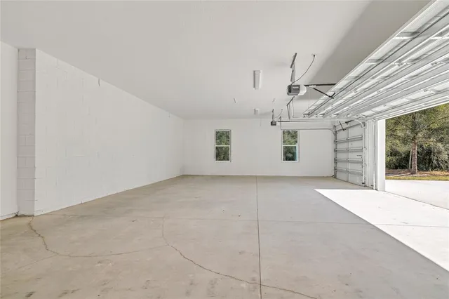 an aerial view of house with yard