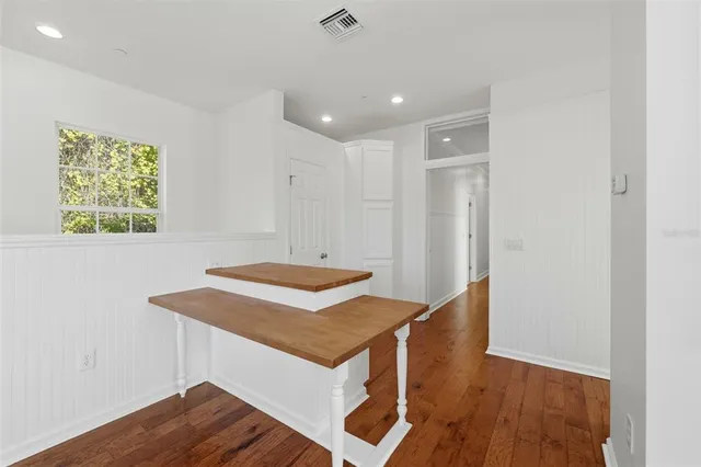 a view of a tree in a yard