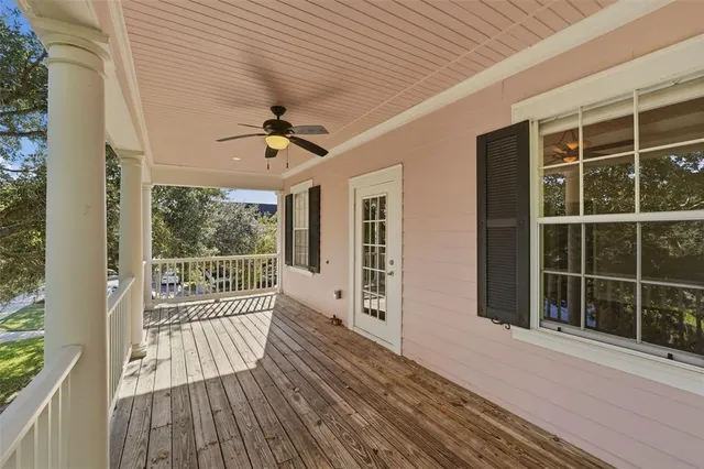 a view of a swimming pool with a yard