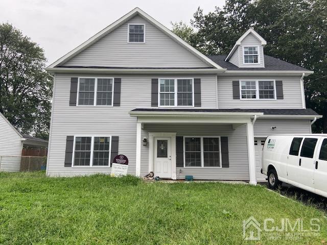 10 Piedmont Road Edison, NJ 08817 - Photo 1 of 1 a front view of a house with a garden