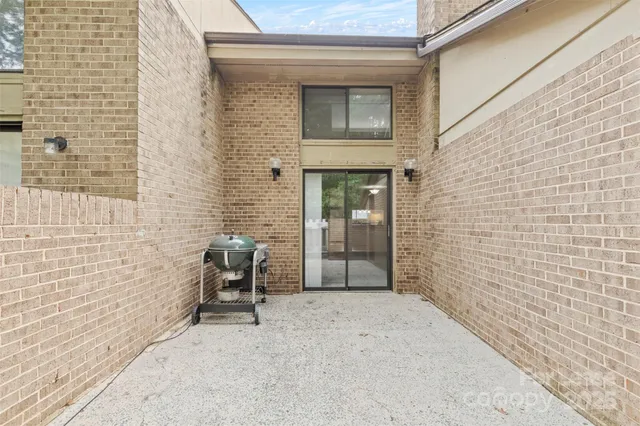 a view of a street with houses on both side