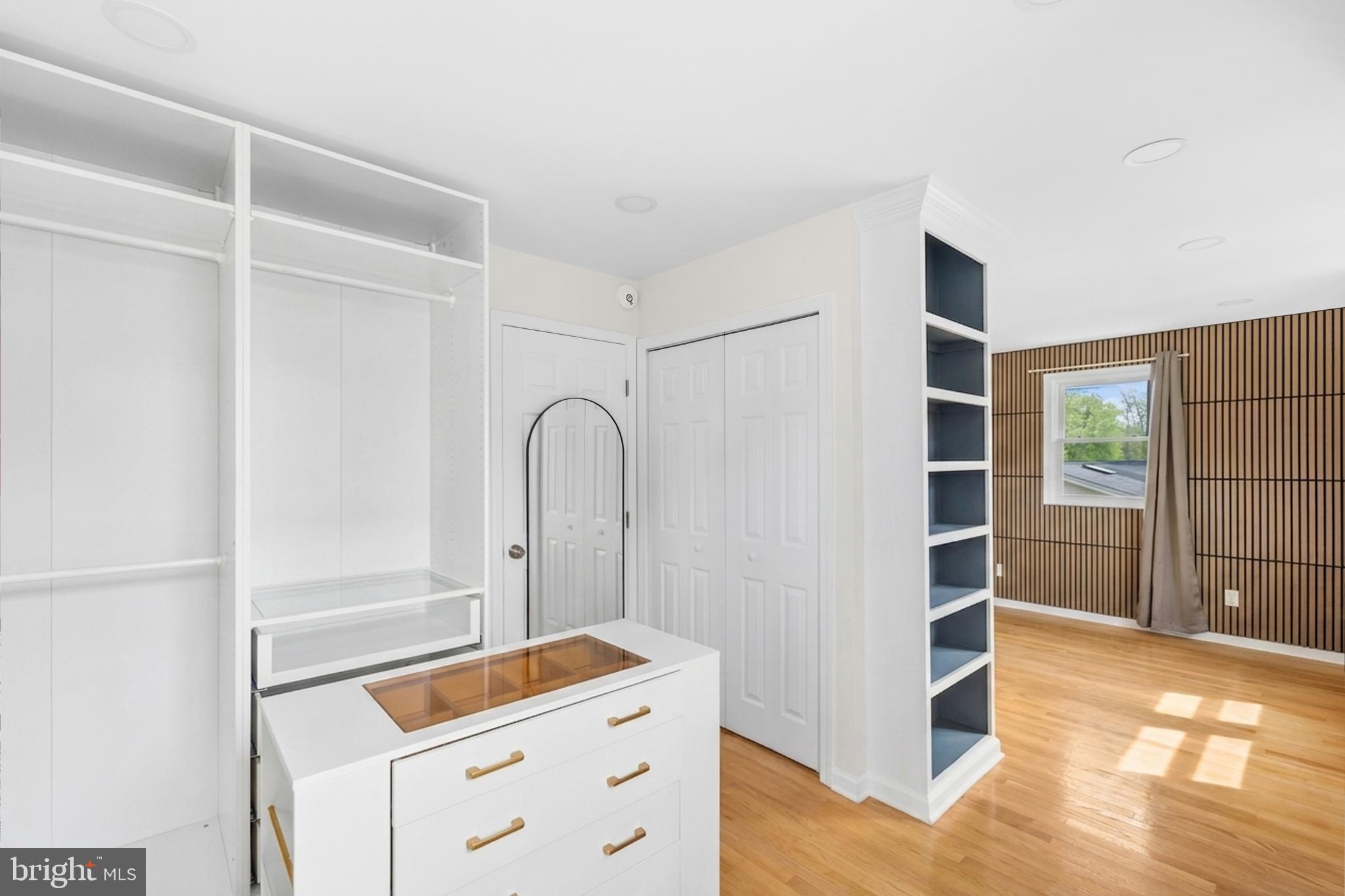 7402 Dunston Street Springfield, VA 22151 - Photo 28 of 37 a room with storage and utility