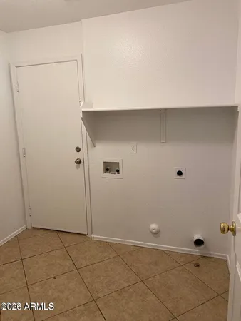 a view of a livingroom with furniture and window