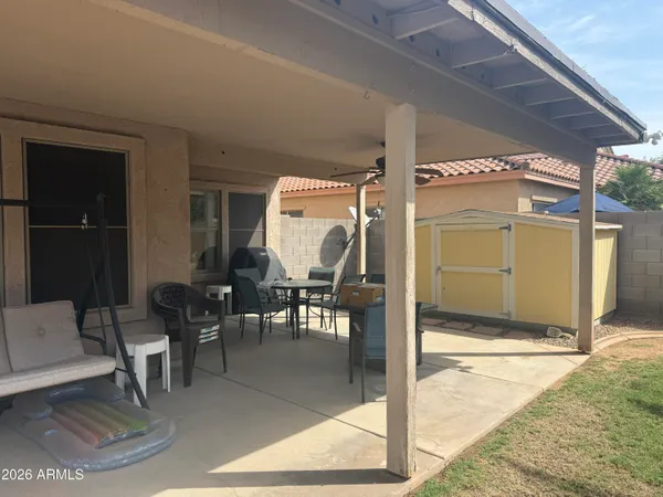 a view of balcony with wooden floor