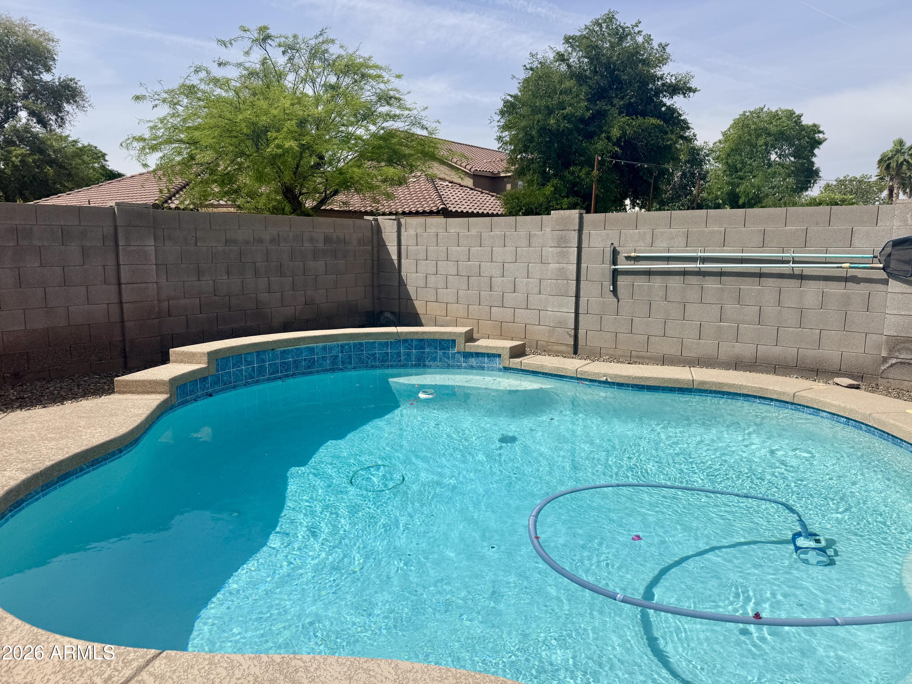 3427 East Derringer Way Gilbert, AZ 85297 - Photo 22 of 23 a view of a backyard