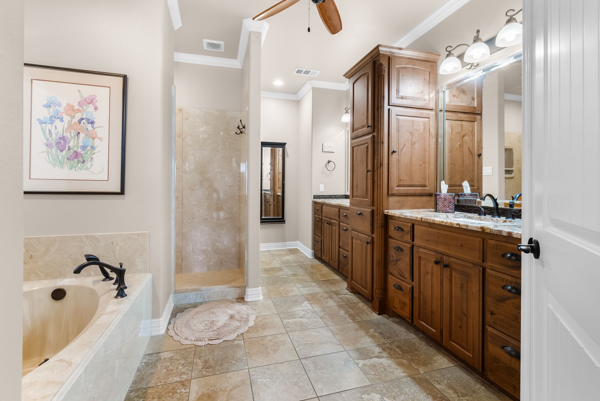 1735 Alta Vista Loop Temple, TX 76502 - Photo 11 of 38 a bathroom with a tub sink shower and mirror
