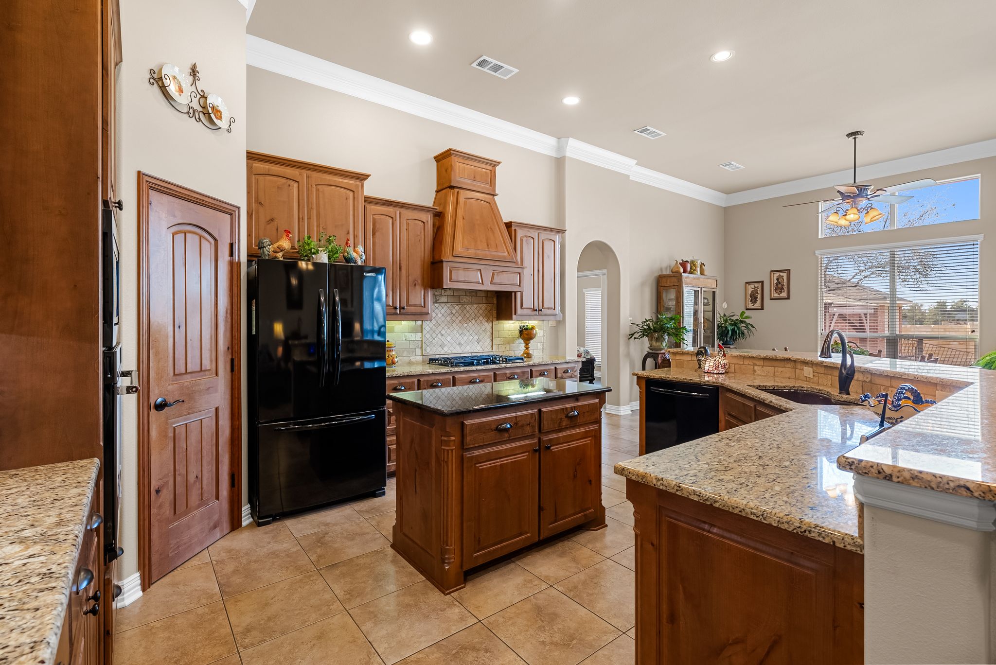 1735 Alta Vista Loop Temple, TX 76502 - Photo 18 of 38 a kitchen with stainless steel appliances granite countertop a refrigerator a sink a stove and a refrigerator
