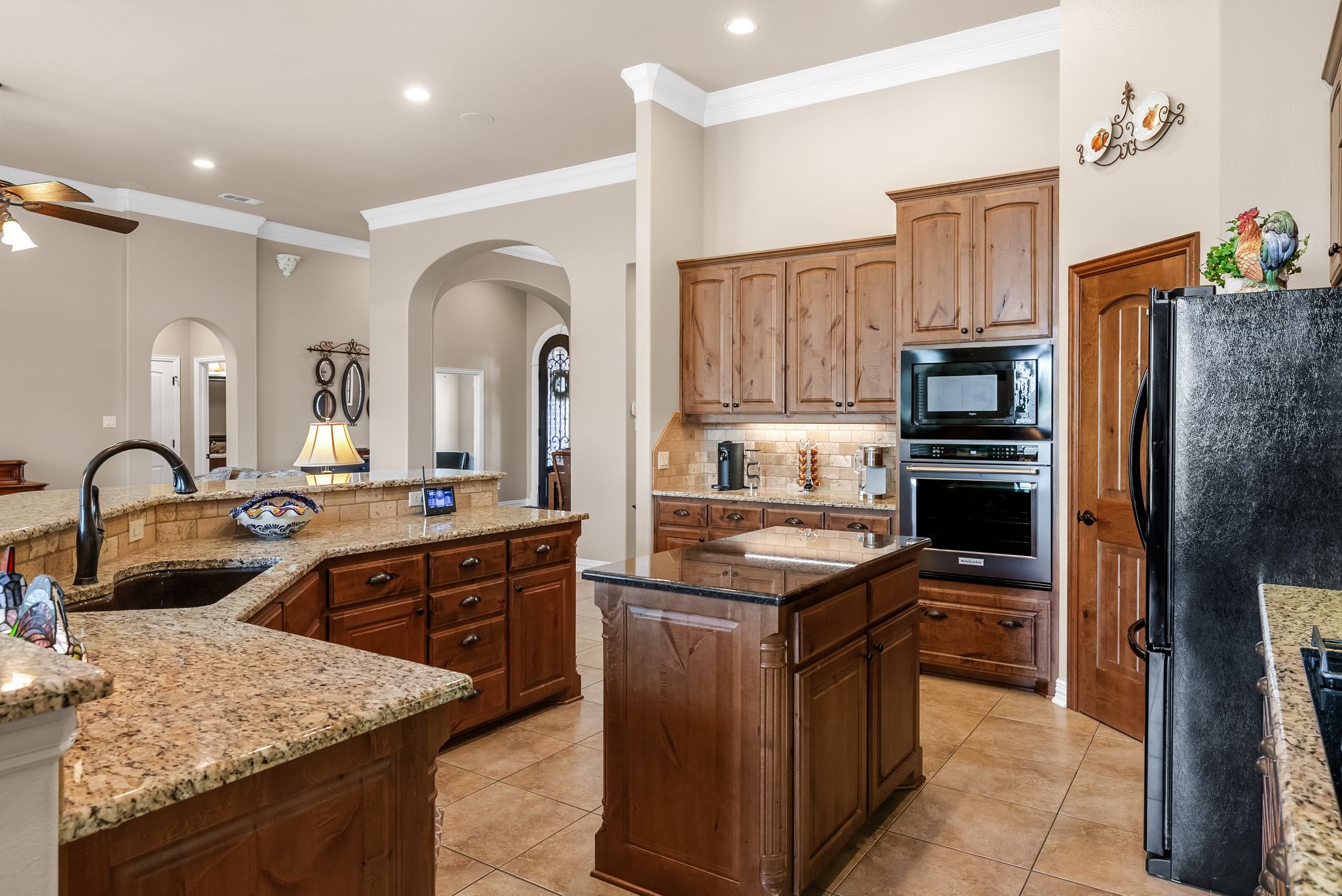 1735 Alta Vista Loop Temple, TX 76502 - Photo 19 of 38 a kitchen with stainless steel appliances granite countertop a sink stove and refrigerator