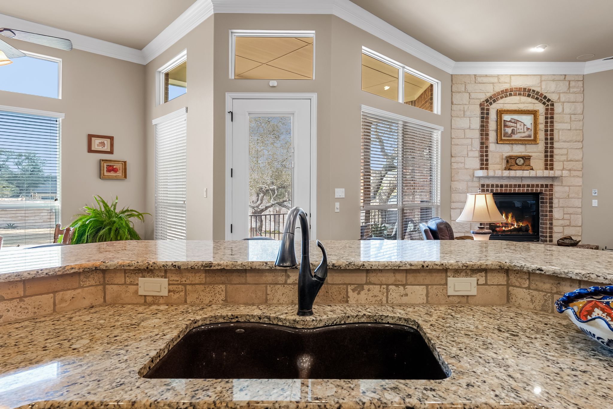 1735 Alta Vista Loop Temple, TX 76502 - Photo 38 of 38 a view of a kitchen with granite countertop a sink and a window
