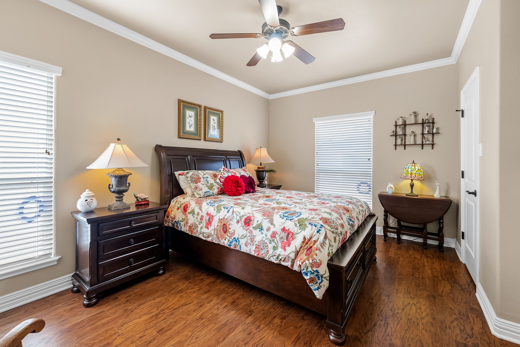 1735 Alta Vista Loop Temple, TX 76502 - Photo 20 of 38 a bedroom with a bed and a chandelier
