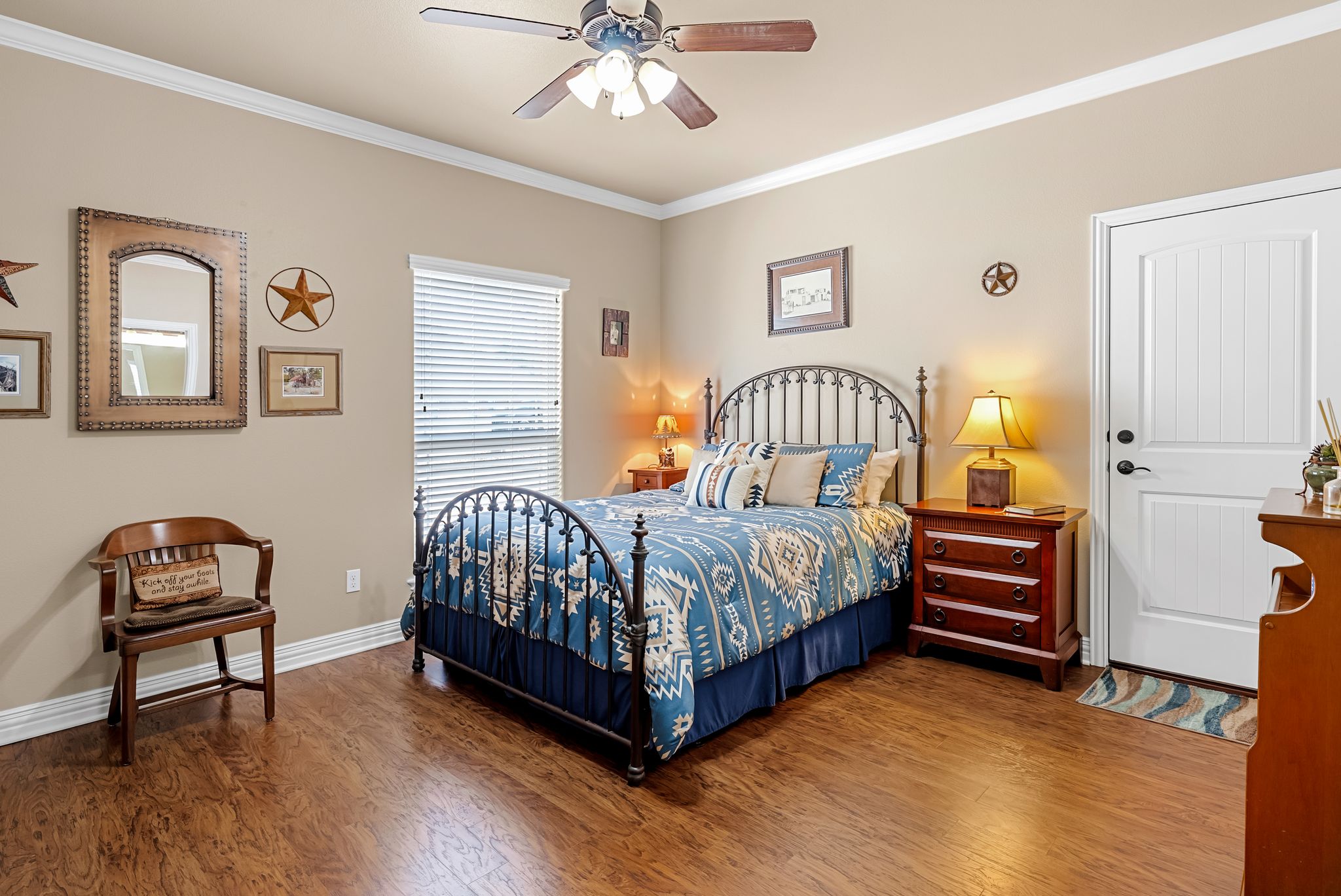 1735 Alta Vista Loop Temple, TX 76502 - Photo 23 of 38 a bedroom with a bed and wooden floor