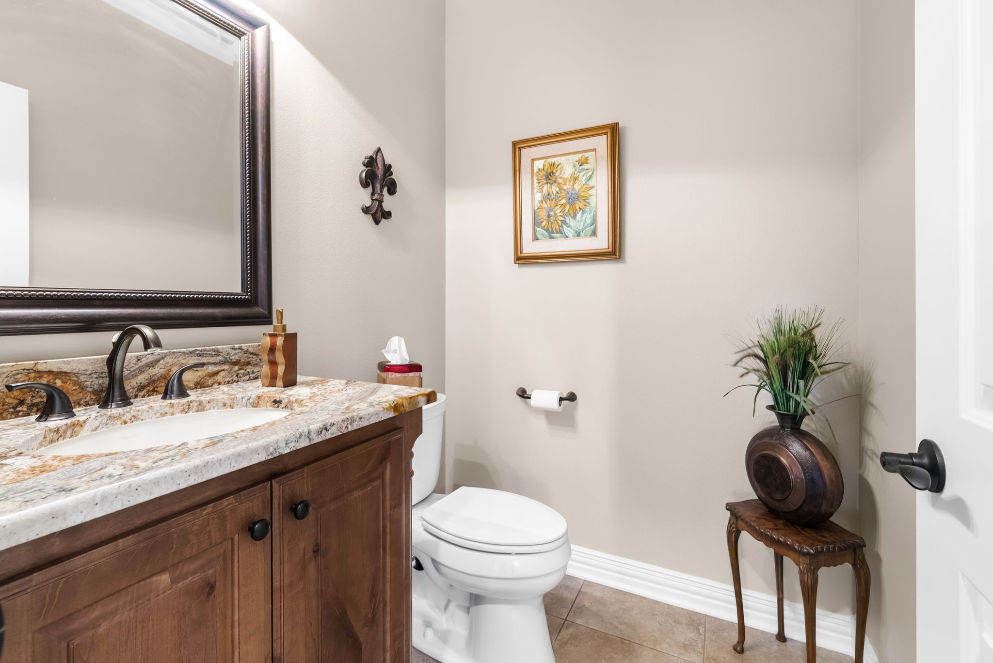 1735 Alta Vista Loop Temple, TX 76502 - Photo 8 of 38 a bathroom with a toilet sink and mirror