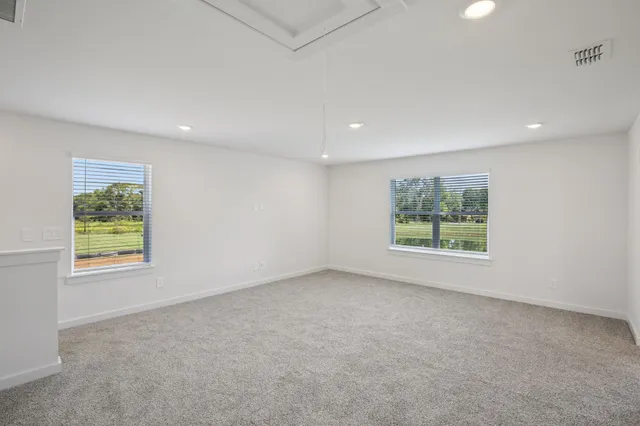 an empty room with windows