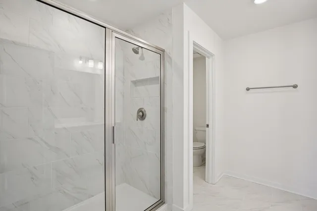 a view of a garden with an ocean