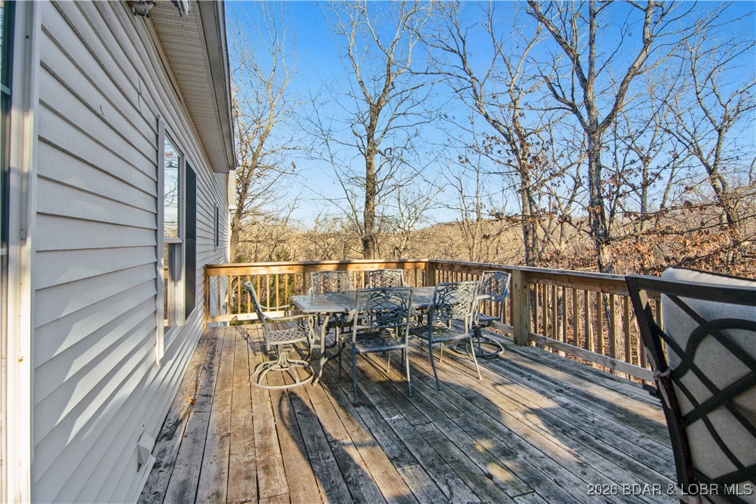 22 Navajo Road Four Seasons, MO 65049 - Photo 23 of 42 The upstairs has a nice sized patio perfect for en