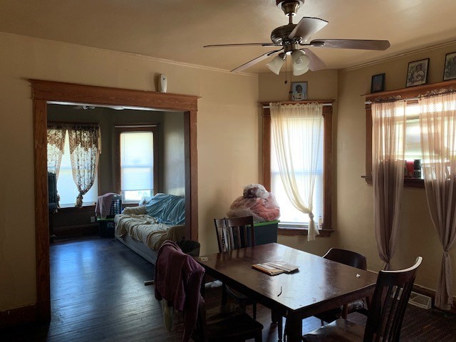 5929 West Rice Street Chicago, IL 60651 - Photo 6 of 29 a living room with furniture and a wooden floor
