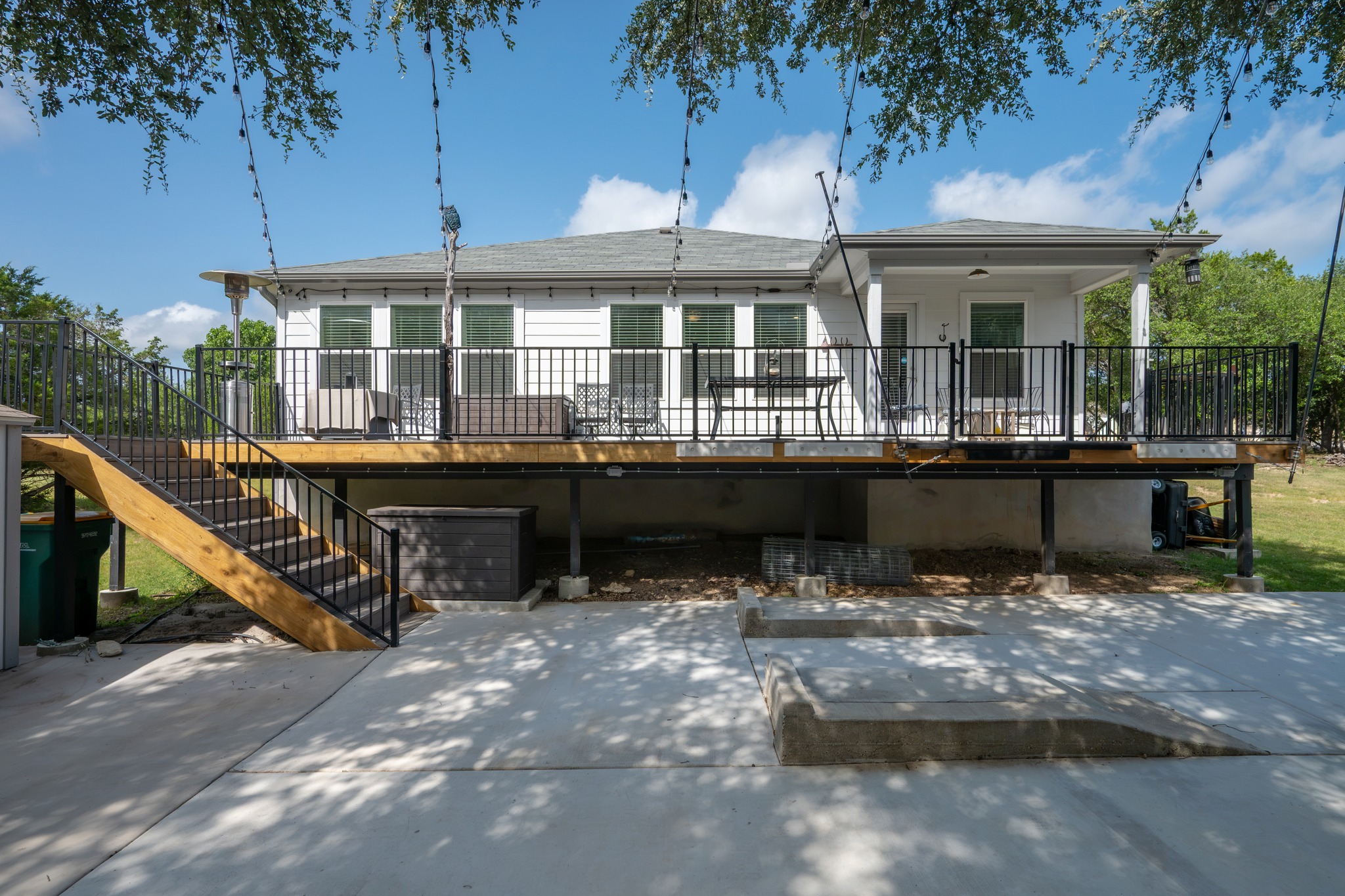 21006 Santa Rosa Avenue Lago Vista, TX 78645 - Photo 20 of 26 A grand elevated deck extends from the residence, perfect for enjoying outdoor moments.