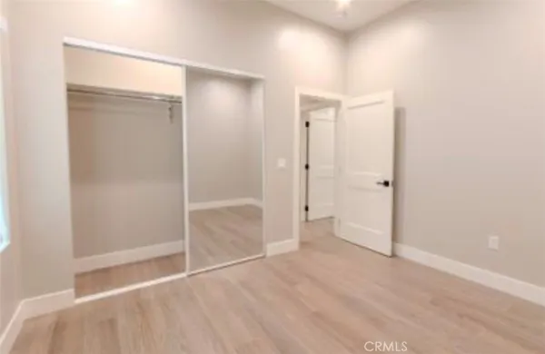a bathroom with a shower and a glass door