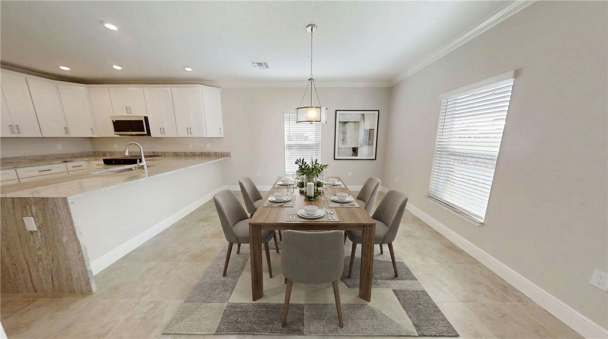 418 Easy Street Sebastian, FL 32958 - Photo 11 of 34 a view of a dining room with furniture