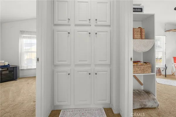 a bed room with furniture and a window