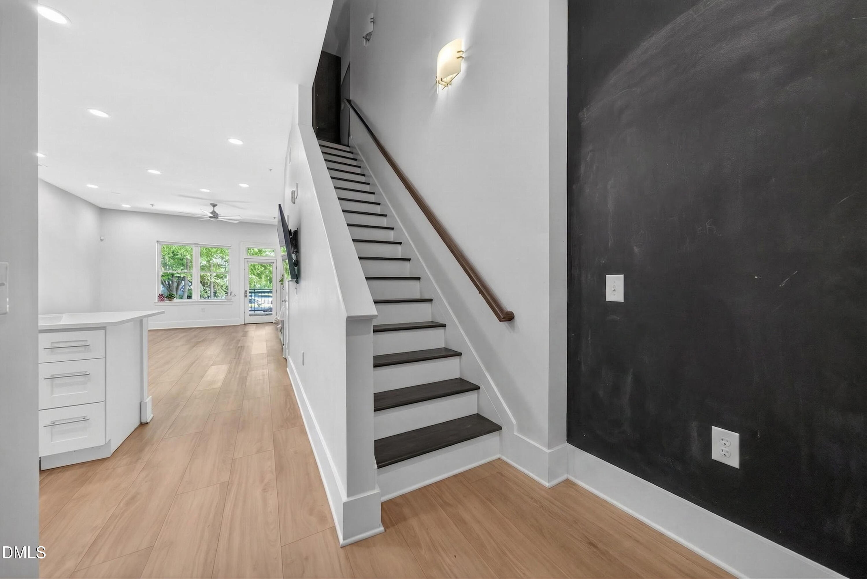 444 South Blount Street, Unit 111 Raleigh, NC 27601 - Photo 8 of 40 a view of entryway with wooden floor