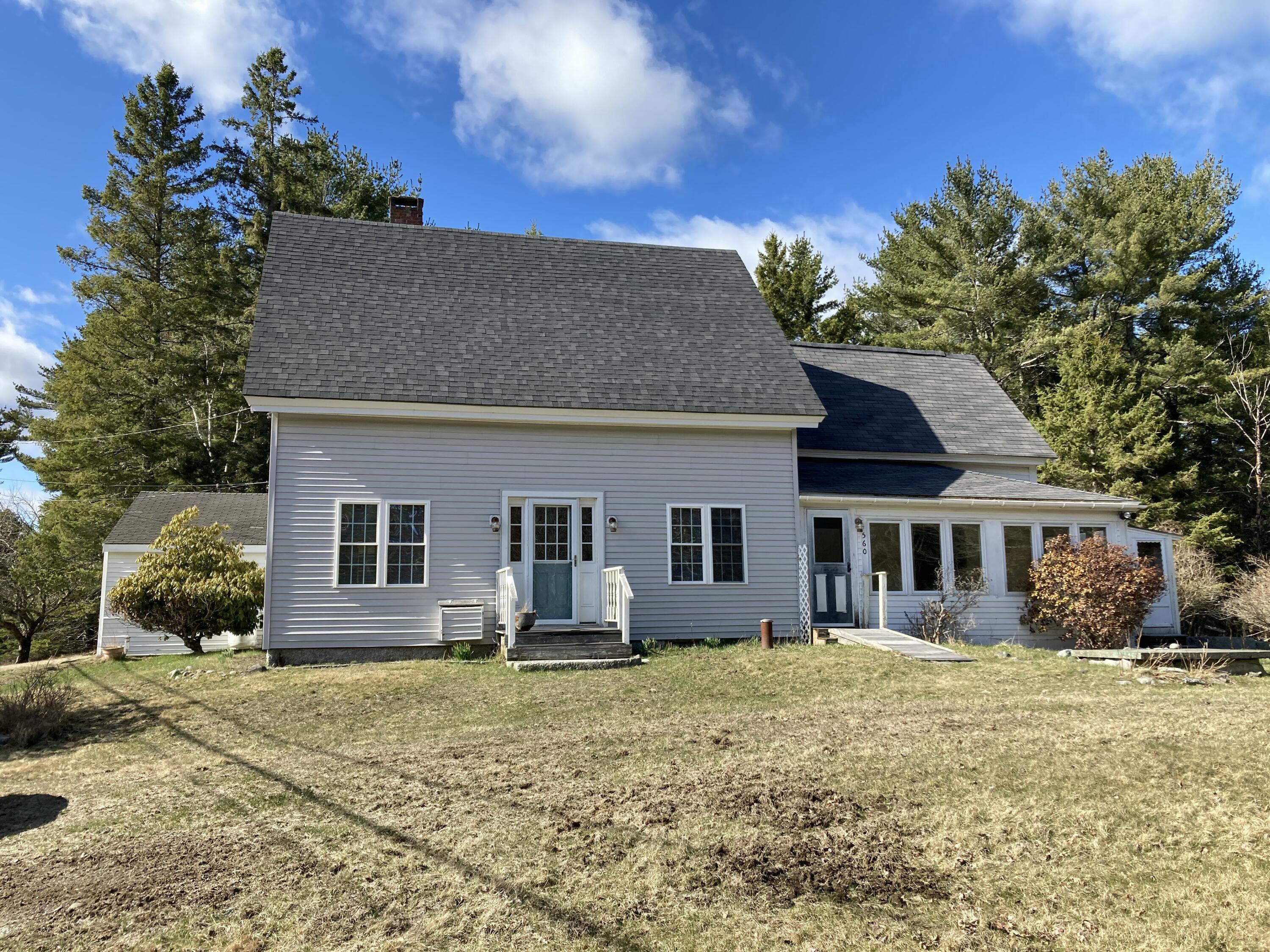 560 Point Road Hancock, ME 04640 - Photo 1 of 17 South side of house front field.