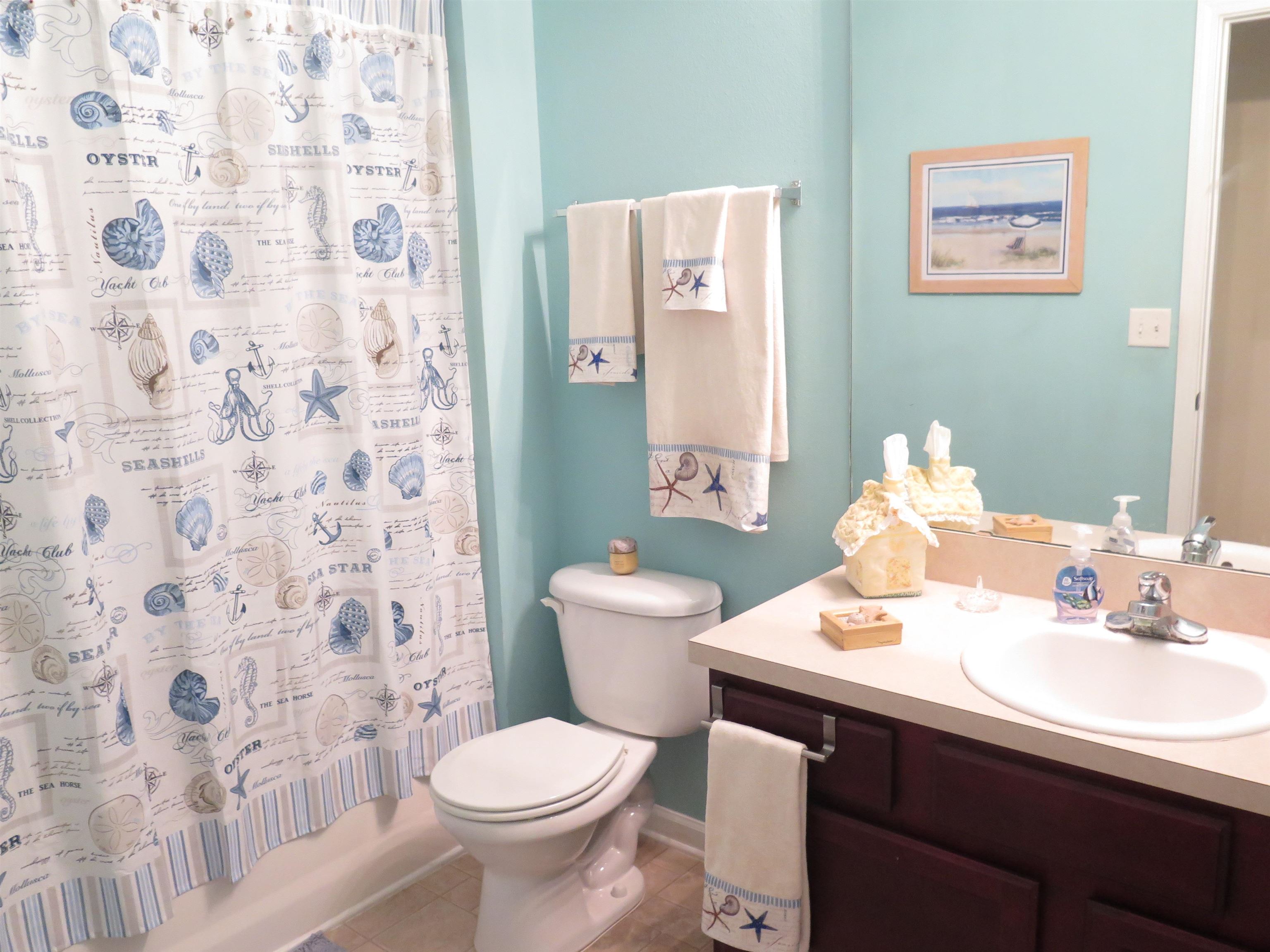 2534 Golden Lake Loop St. Augustine, FL 32084 - Photo 13 of 16 a bathroom with a sink and a toilet