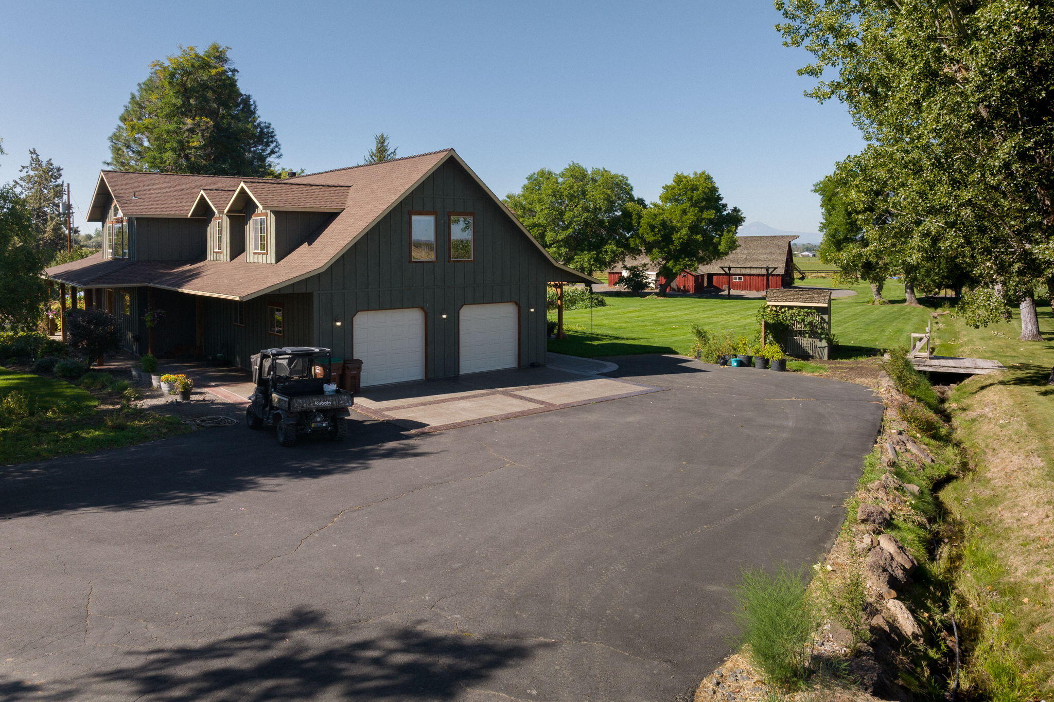 11311 Fleming Road Powell Butte, OR 97753 - Photo 2 of 58 north side main home, paved drive