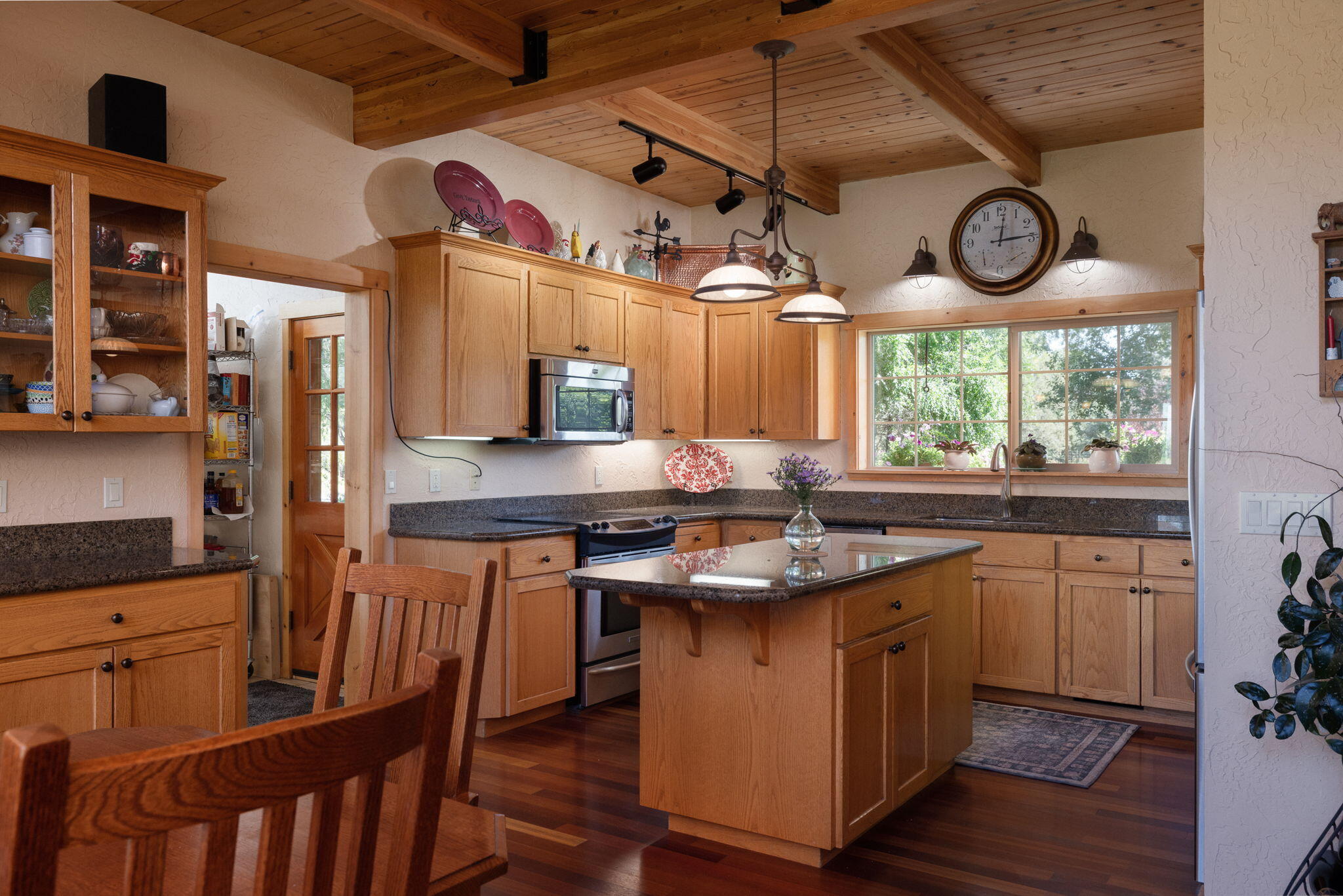 11311 Fleming Road Powell Butte, OR 97753 - Photo 22 of 58 kitchen / all granite counters