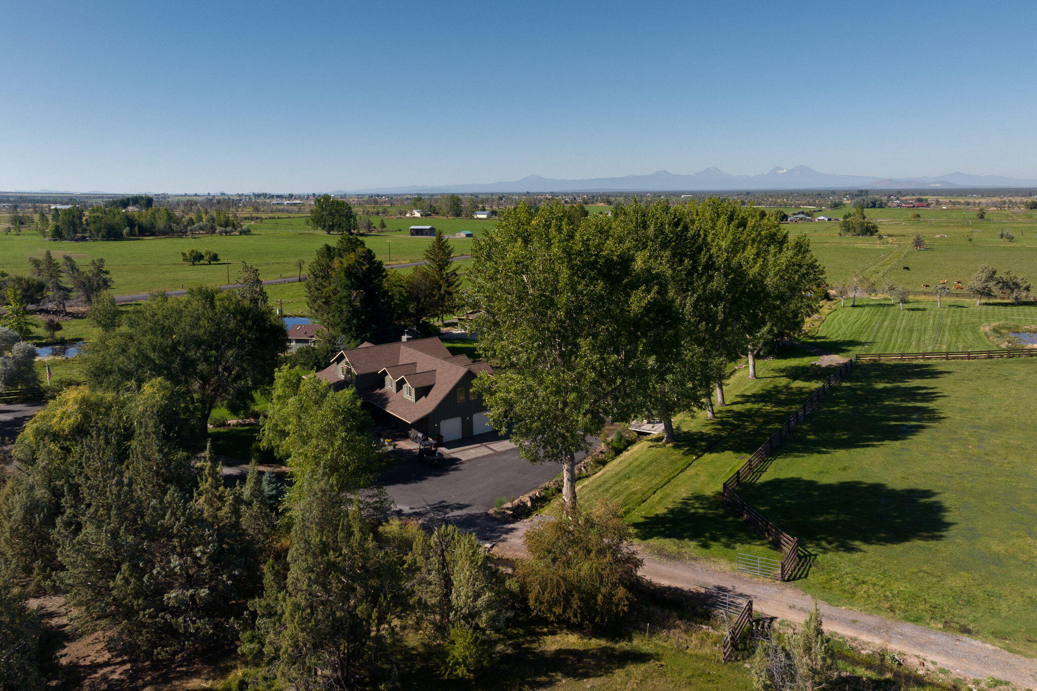 11311 Fleming Road Powell Butte, OR 97753 - Photo 10 of 58 drone overlooking farmestead