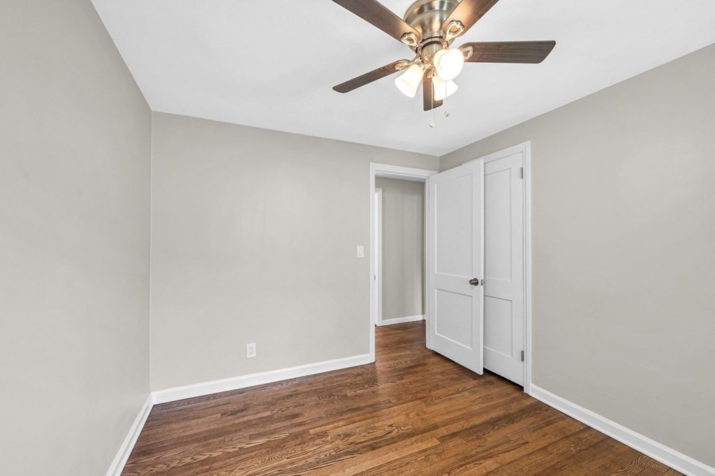 20 Drexel Street Springfield, MA 01104 - Photo 20 of 32 a view of an empty room with wooden floor