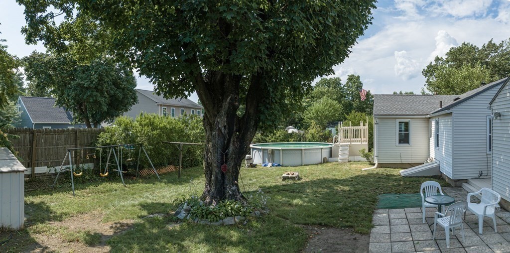 20 Drexel Street Springfield, MA 01104 - Photo 26 of 32 a backyard of a house with seating space